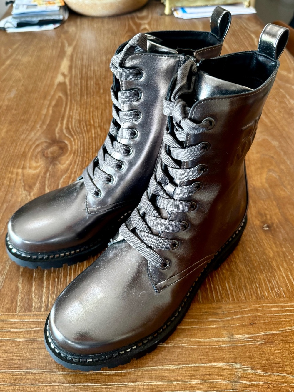 EUC DKNY mirror pewter patent combat boots 8